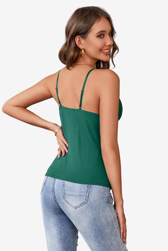 Green cami bralette with spaghetti straps, paired with jeans, Y2k style, casual chic.