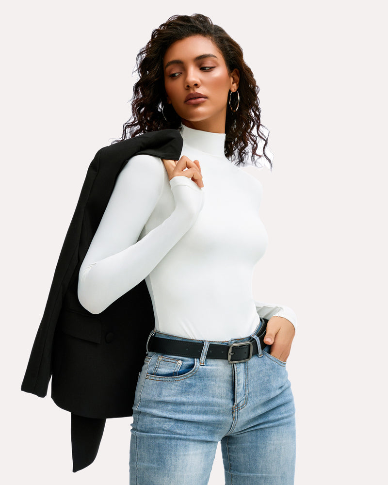 White high-neck bodysuit shapewear with jeans and a blazer. A stylish and versatile outfit.