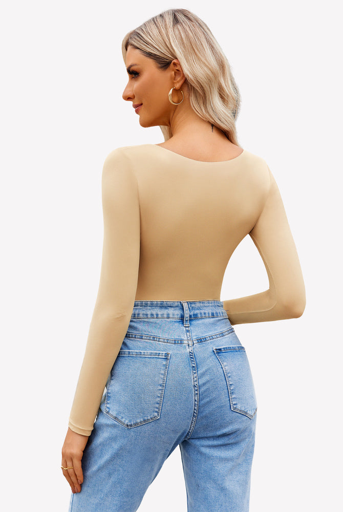 Beige square neck long sleeve bodysuit, form-fitting, shows bodyline, paired with jeans