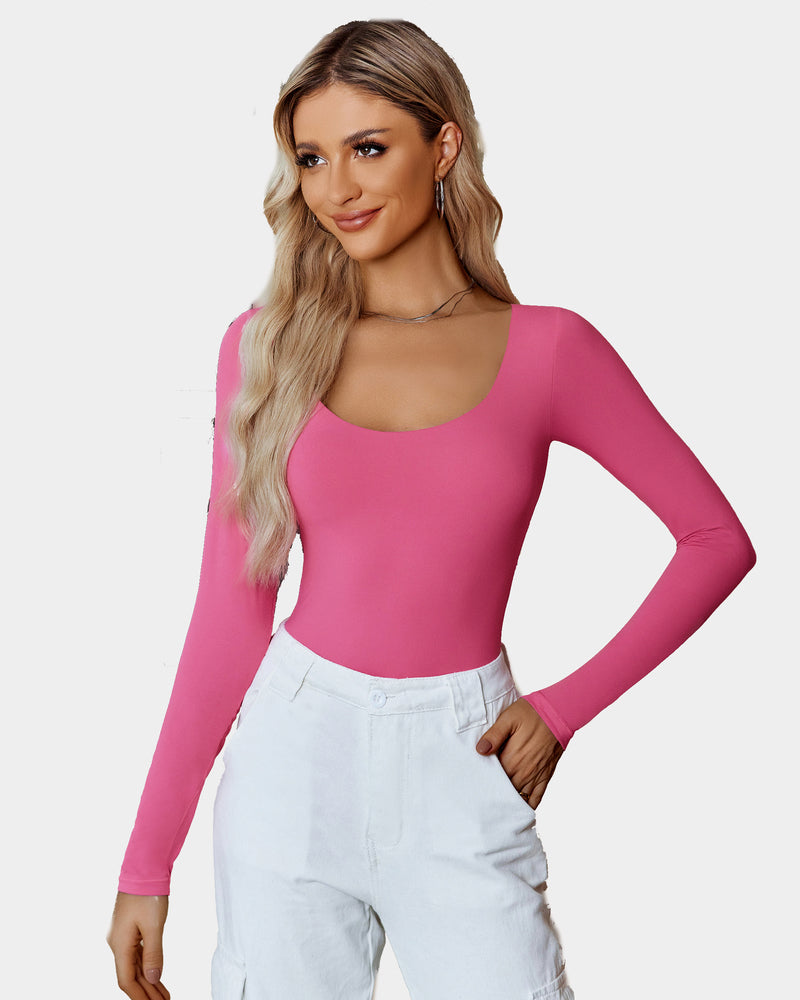 Pink long sleeve scoop neck bodysuit shapewear with white pants, flattering fit