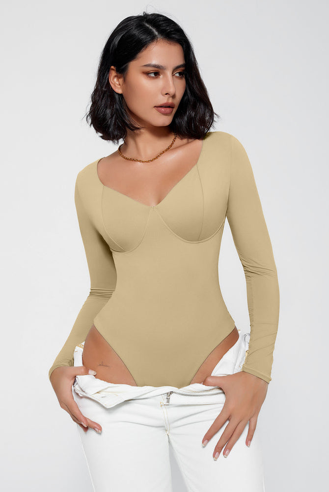 Tan long sleeve bodysuit shapewear, V-neck, tummy control, flattering fit, multiple occasions.