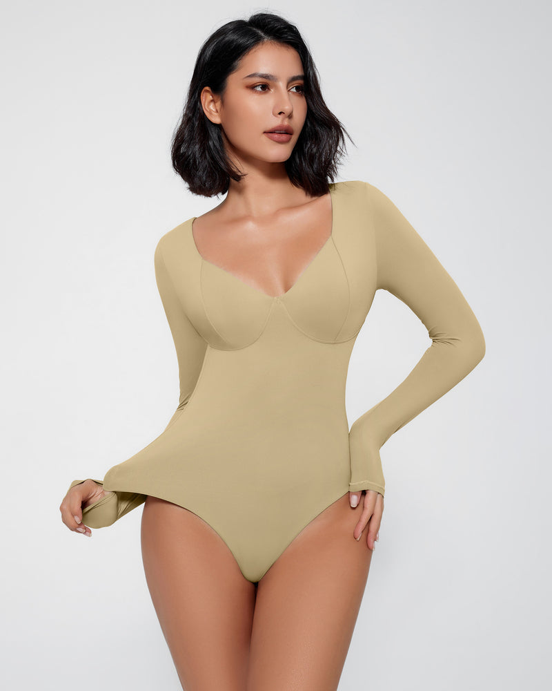 Tan long sleeve bodysuit shapewear with V-neck and tummy control, creating a flattering silhouette.