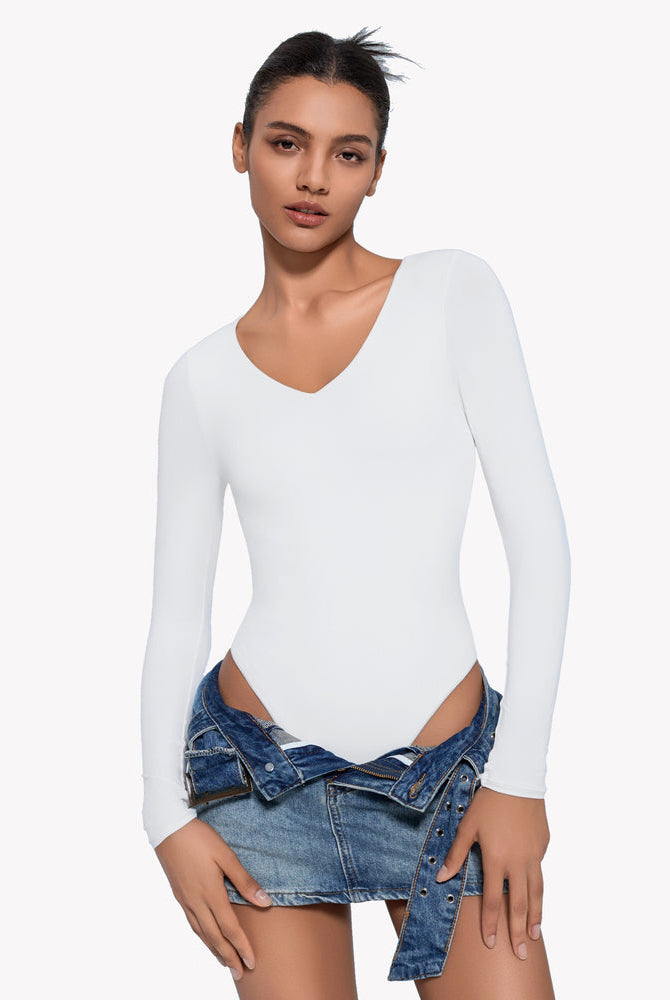 White long-sleeve V-neck bodysuit. Curve-enhancing, double-lined design for a confident look.