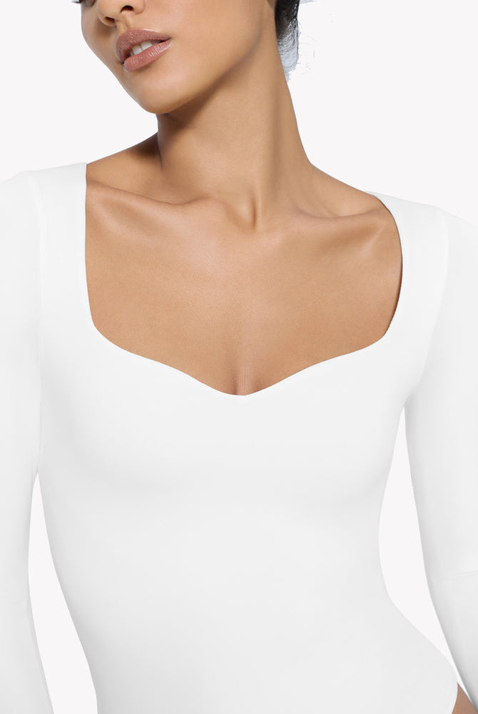 White sweetheart neckline long sleeve bodysuit shapewear. Premium comfortable design for shaping.