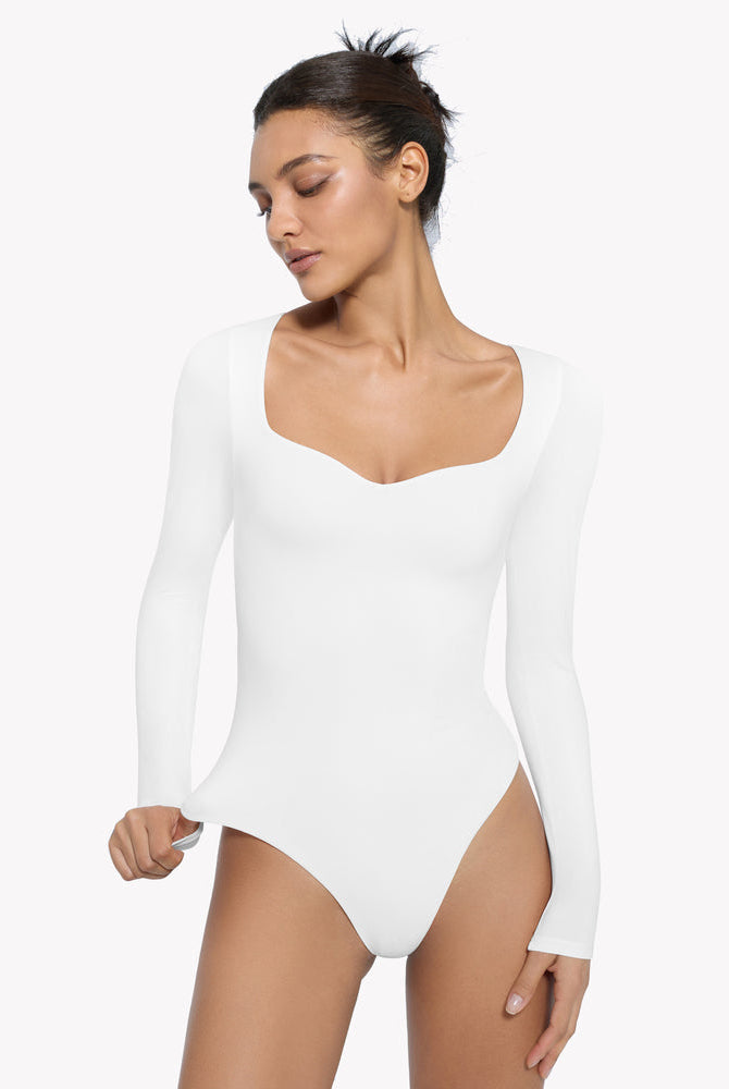White sweetheart neckline long sleeve shapewear bodysuit. Comfortable and shaping design.