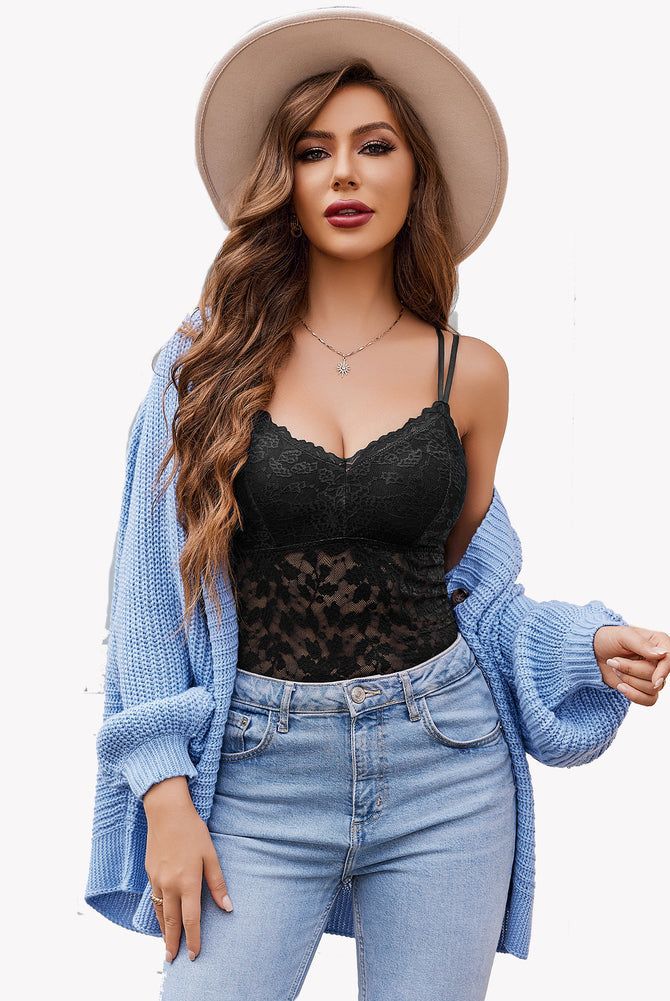 Black lace V-neck tube top, floral design, with adjustable straps, blue cardigan and jeans.