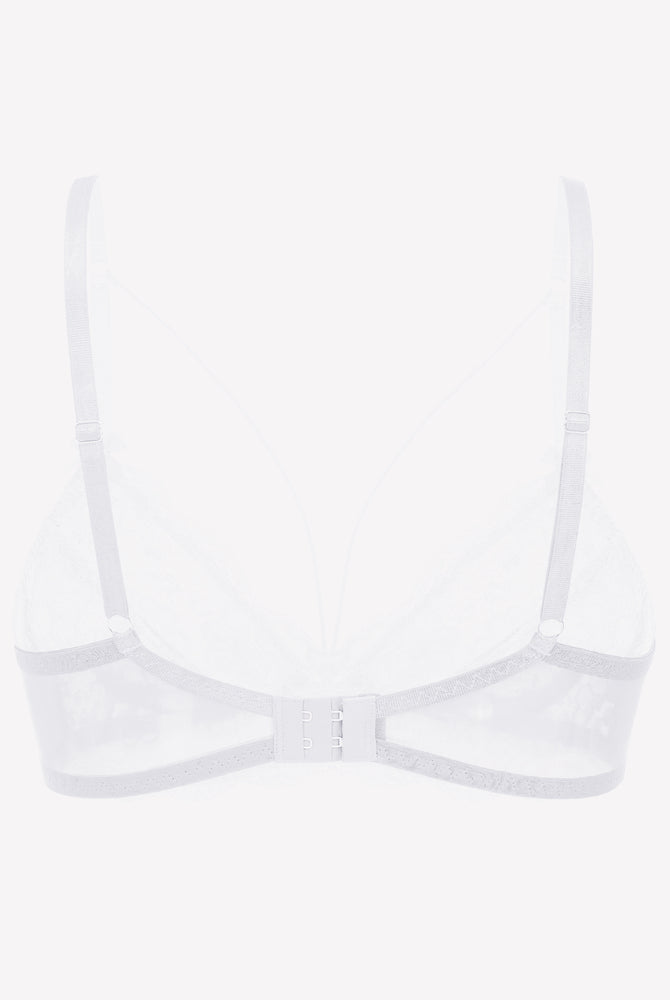 White lace unlined strappy bra with underwire support and adjustable straps. See-through design.
