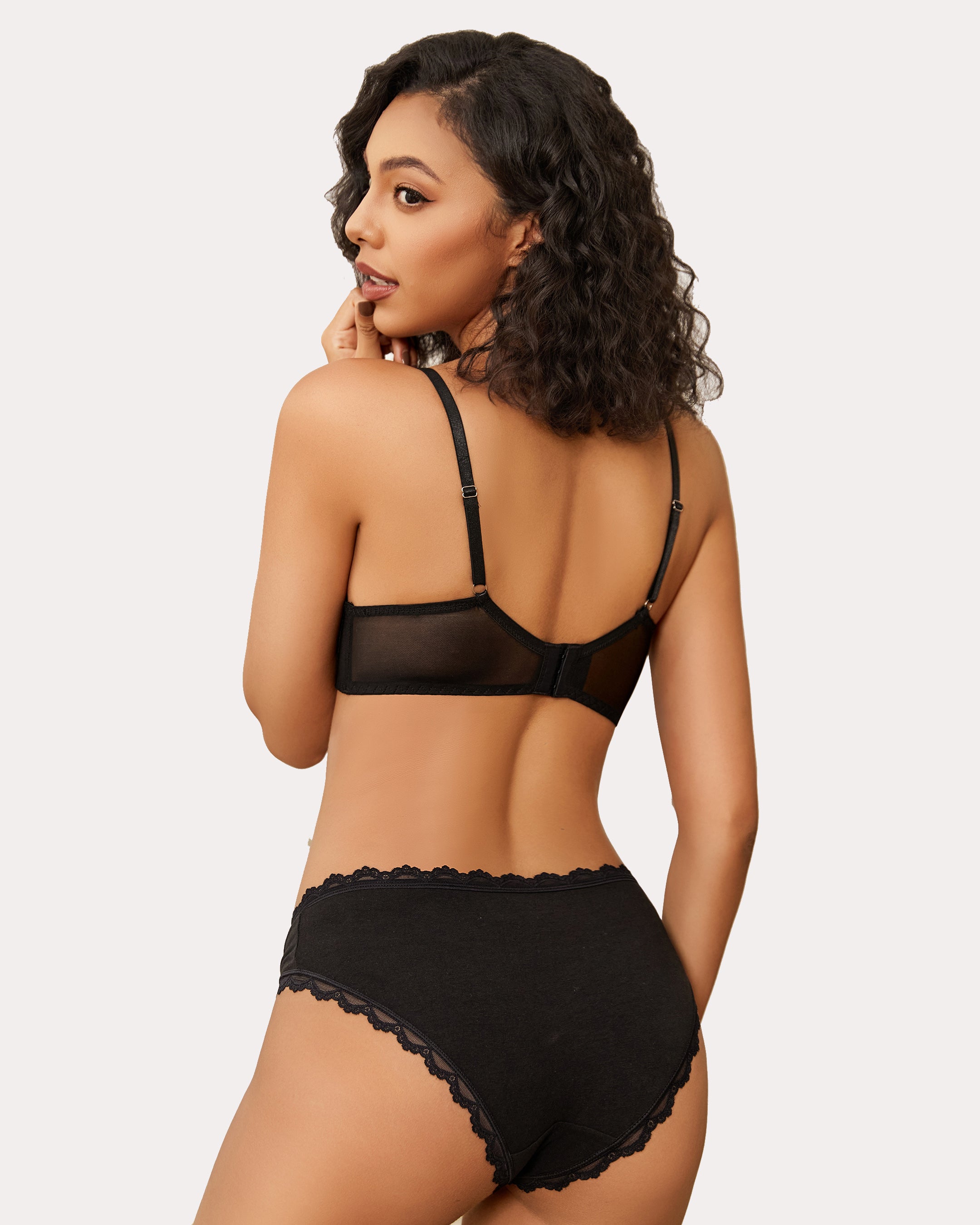 Black minimizer bra and panty set with sheer design for large breasts. Sexy lingerie.