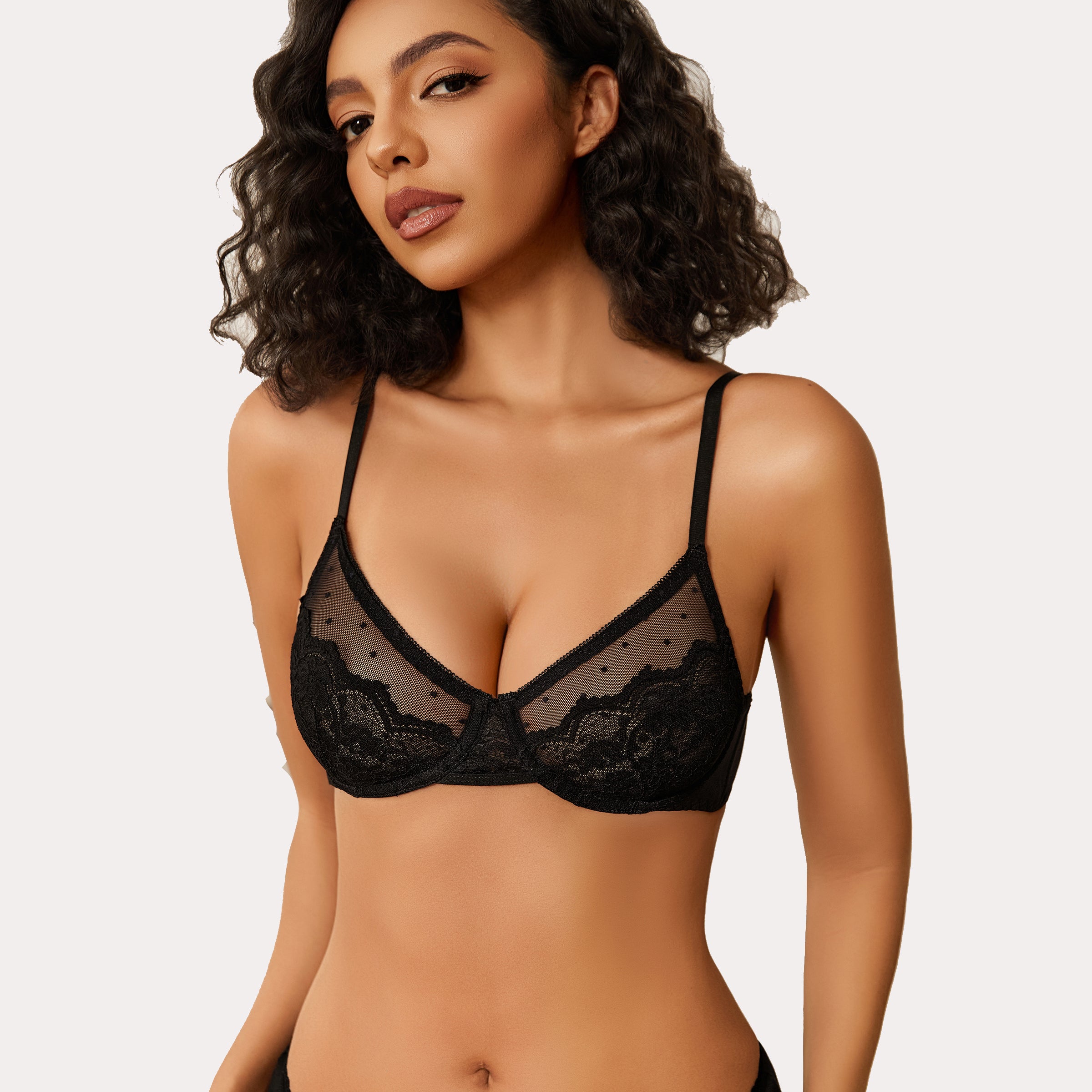Black minimizer bra with floral lace and sheer design for large breasts. Sexy lingerie.