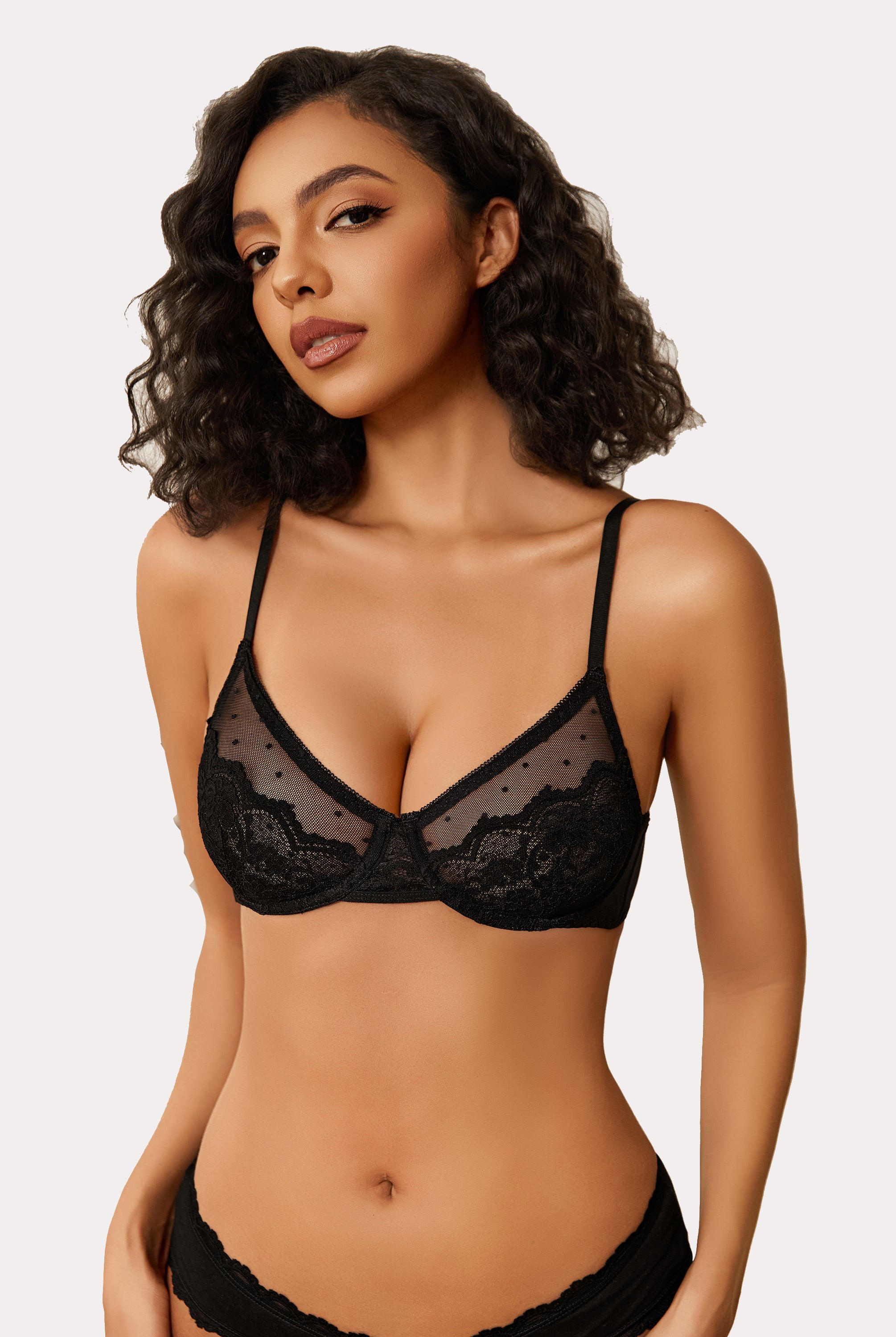 Black minimizer bra with floral lace and sheer design for large breasts. Sexy lingerie.