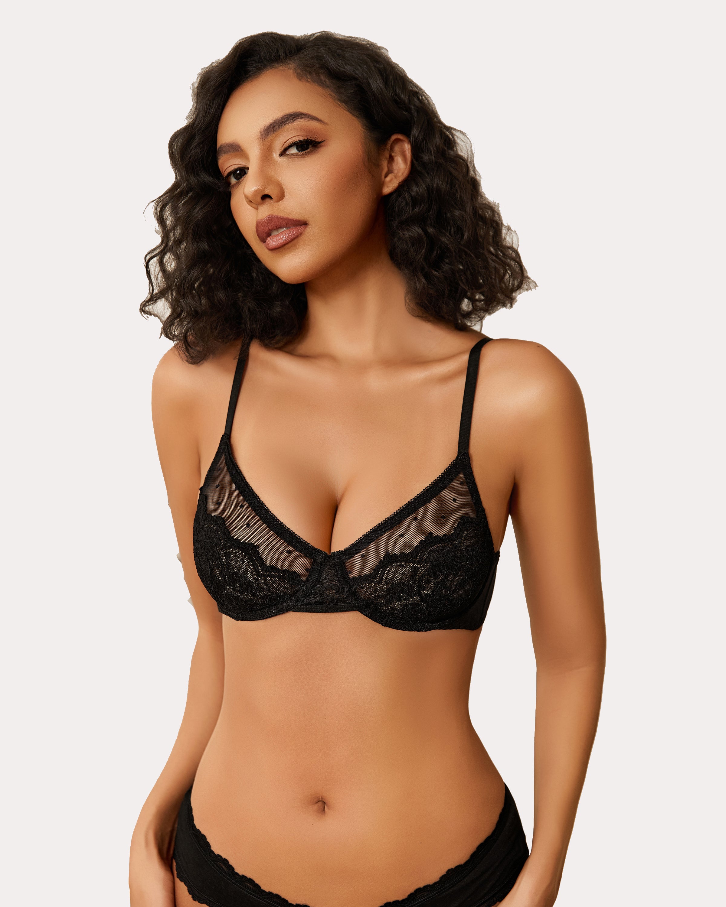 Black minimizer bra with floral lace and sheer design for large breasts. Sexy lingerie.