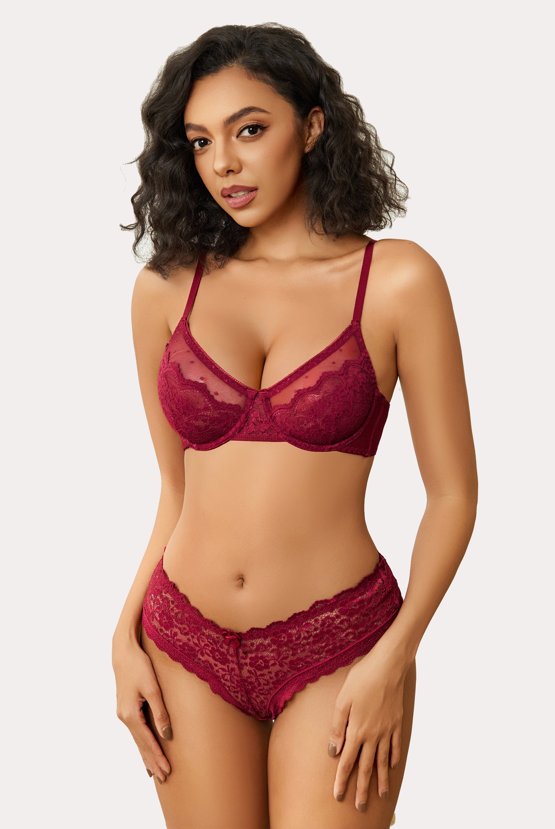 Burgundy floral lace minimizer bra and panty set on a model. Sexy lingerie for large breasts.