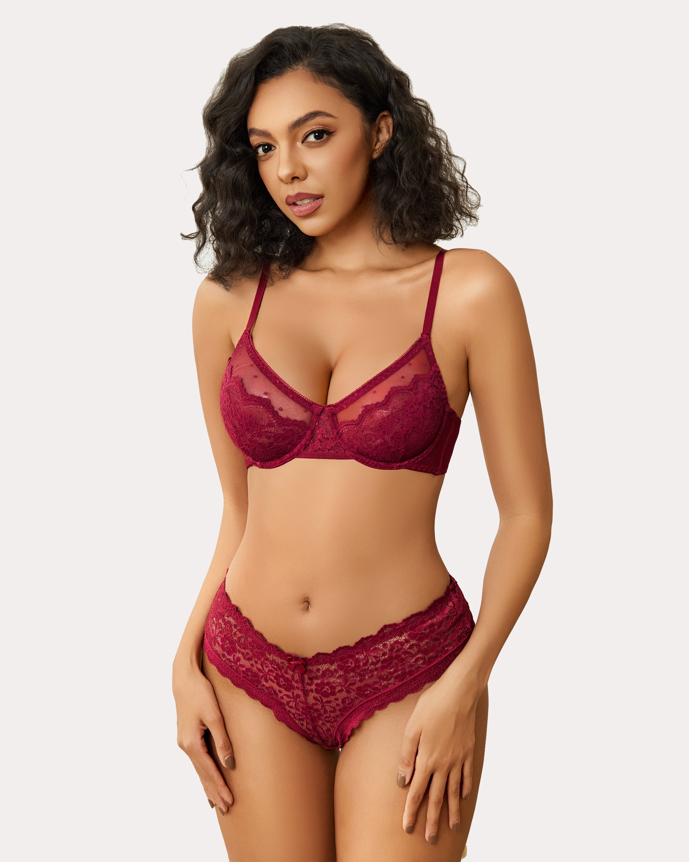 Burgundy floral lace minimizer bra and panty set on a model. Sexy lingerie for large breasts.