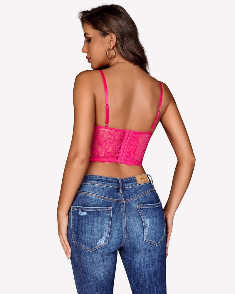Hot pink lace bralette corset top with adjustable straps and blue jeans. Sexy lingerie.