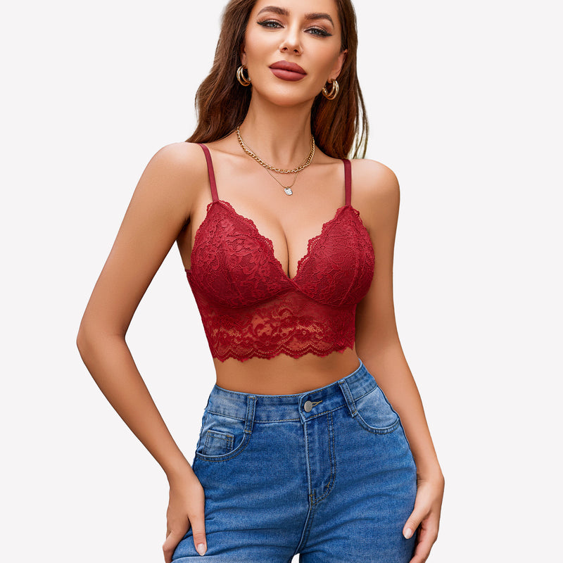 Burgundy red floral lace bustier crop top with adjustable spaghetti straps, paired with denim jeans.