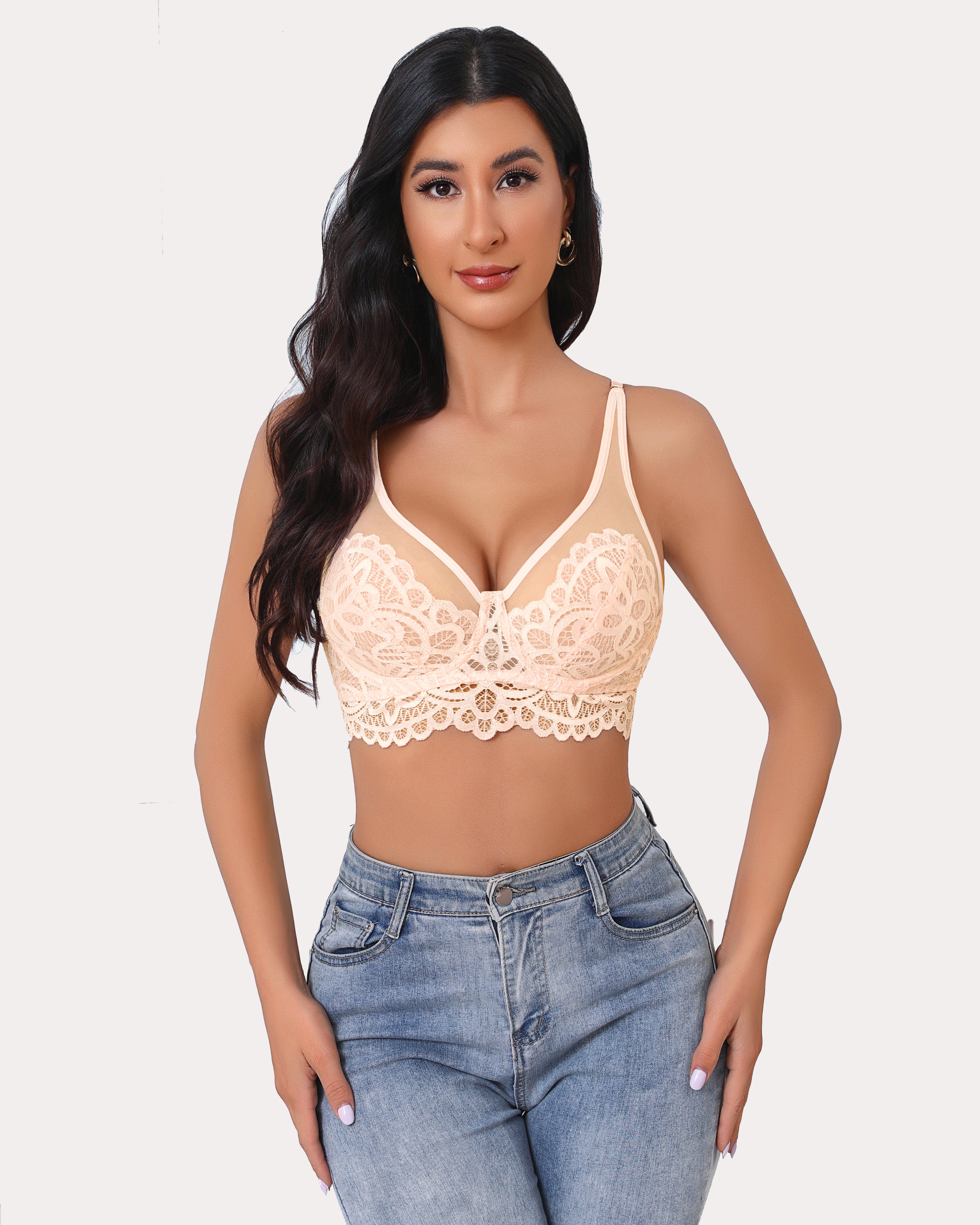 Peach lace bralette with adjustable straps and floral design, paired with jeans. Full coverage bra.