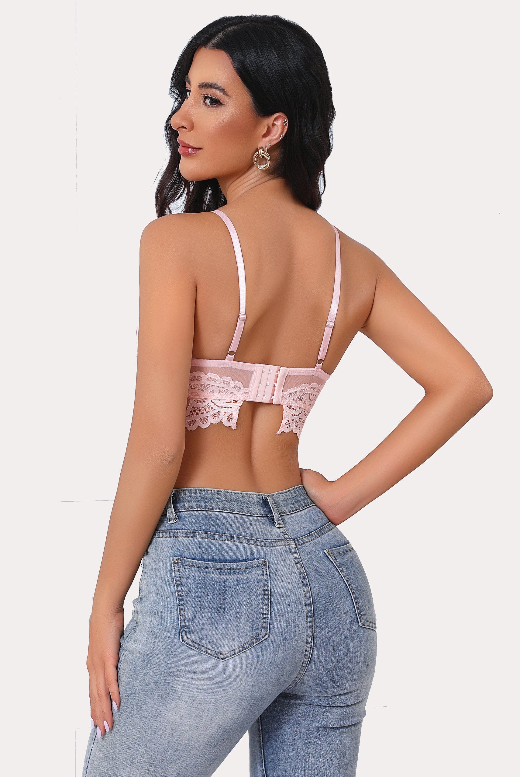 Pink lace bralette with adjustable straps, full coverage, floral design, and U-shaped mesh back