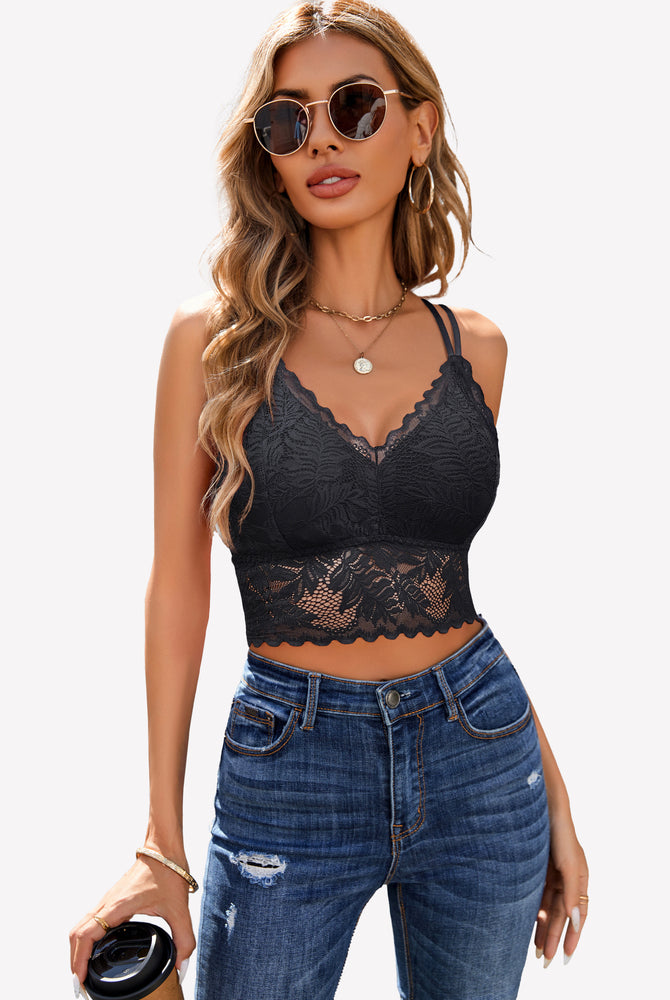 Black lace crop top with scalloped trim, showing a sexy back. A fashionable and confident look.