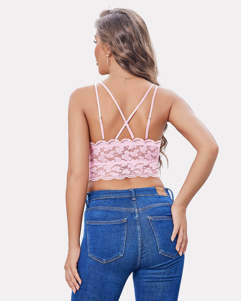 Pink lace crop top with adjustable straps, racerback design, paired with jeans; Y2K fashion