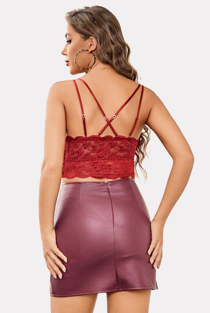 Maroon lace crop top with adjustable straps paired with a leather skirt; Y2K style