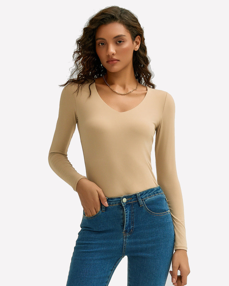 Tan V-neck long sleeve top. Soft, stretchy fabric. A modern, stylish top for a comfortable fit.
