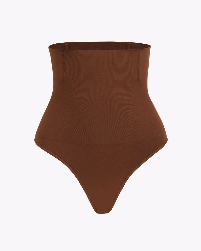 Brown high-waisted tummy control thong shapewear, smooth silhouette, comfortable fit.