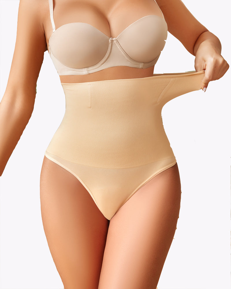 Beige tummy control shapewear. Provides tummy control, comfortable fit, and a smooth silhouette.