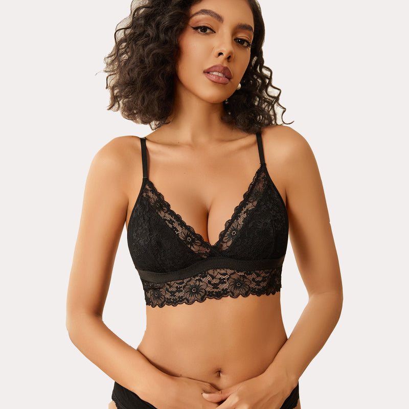 Black lace bralette, wireless and non-padded, paired with matching underwear for a sexy look.