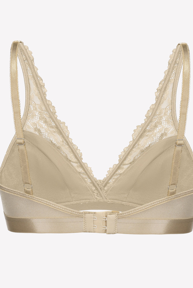Beige lace wireless bralette with adjustable straps and floral lace, showcasing comfort and style