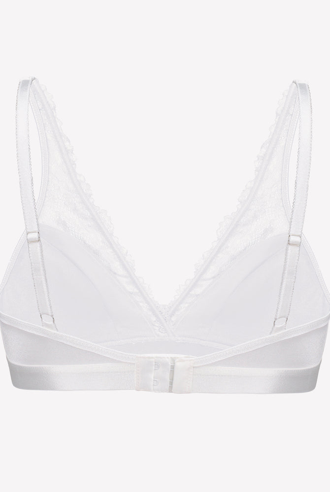 White lace wireless bralette with adjustable straps. Sheer floral lace design for comfort and style.