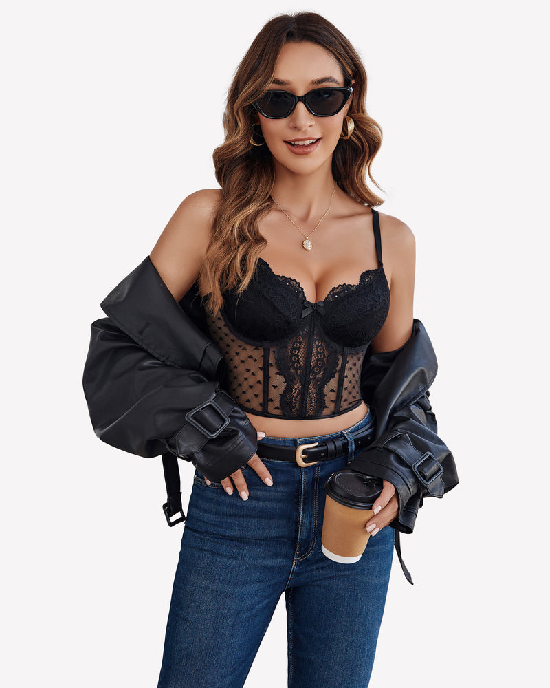 Black lace corset top with underwire and polka dot mesh, with blue jeans and leather jacket.