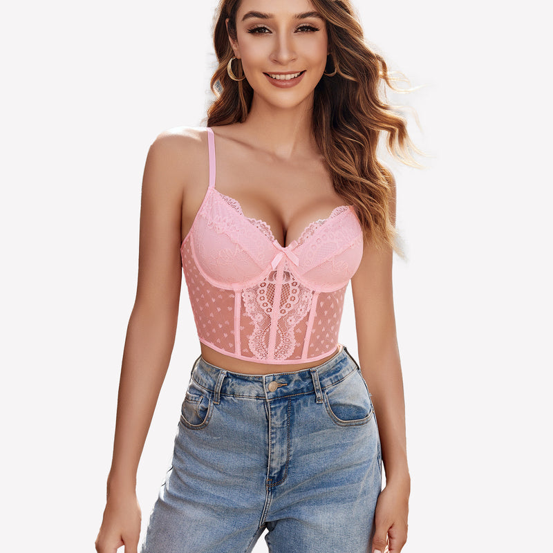Pink lace corset top with underwire, polka dot mesh, and adjustable straps, paired with blue jeans