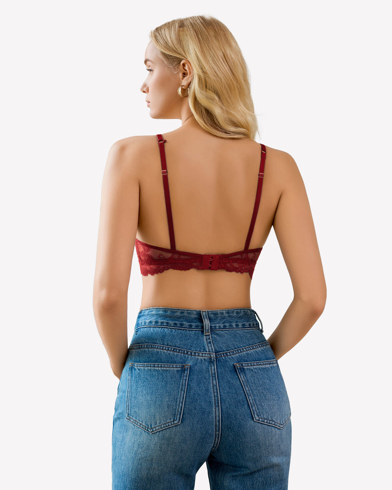 Burgundy floral lace bralette with adjustable straps, paired with blue denim jeans. Seamless fit.