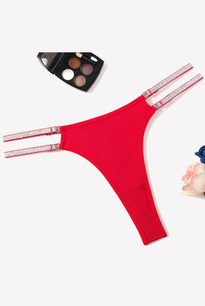 Red low waist Brazilian tanga panties with flashing strap details. Sexy lingerie.