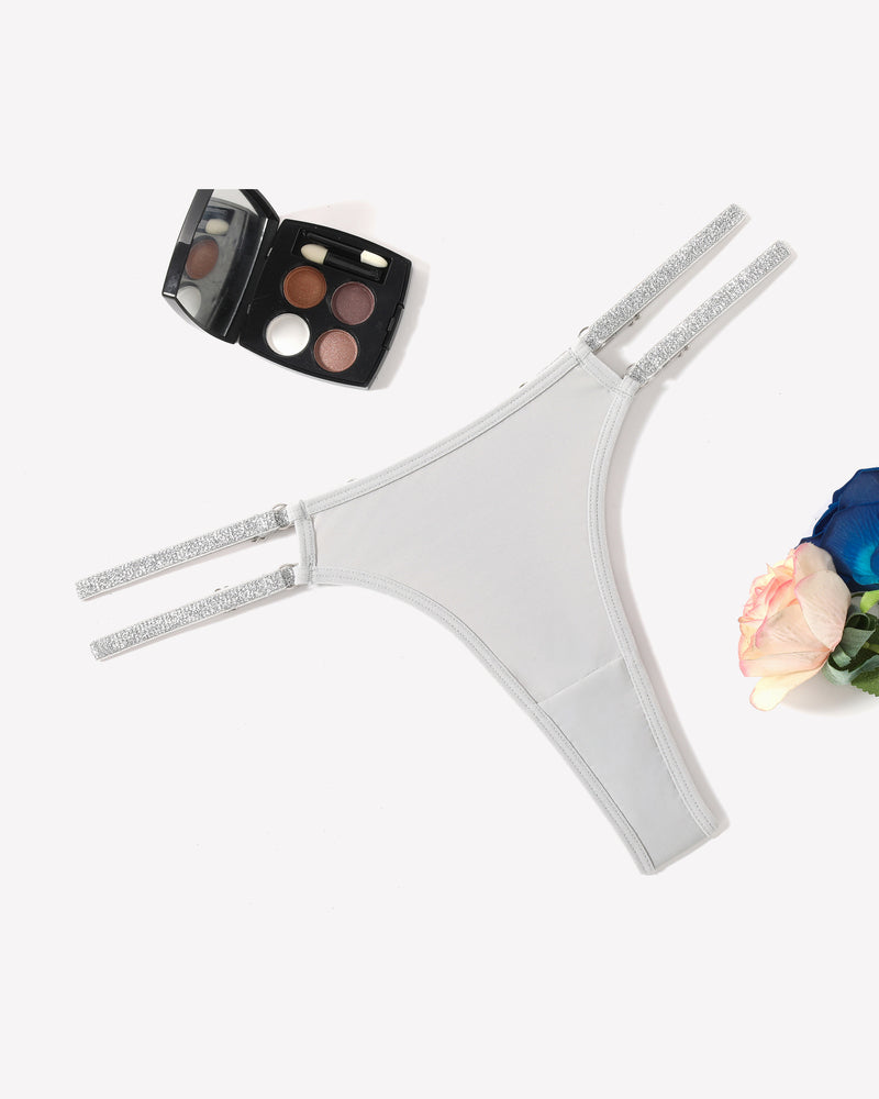 Light gray low waist Brazilian tanga panties with flashing strap details. Sexy lingerie.