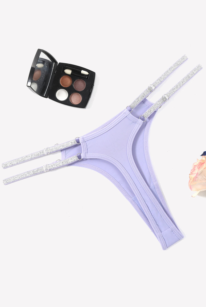 Light purple low waist Brazilian tanga panties with flashing strap details. Sexy lingerie.