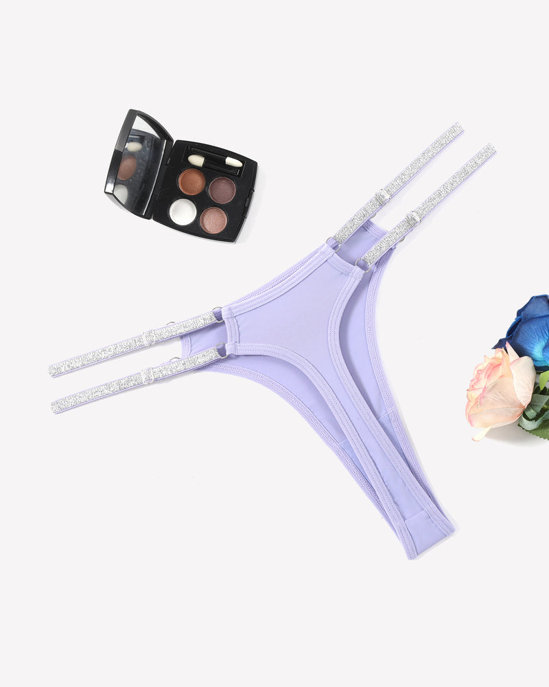 Light purple low waist Brazilian tanga panties with flashing strap details. Sexy lingerie.