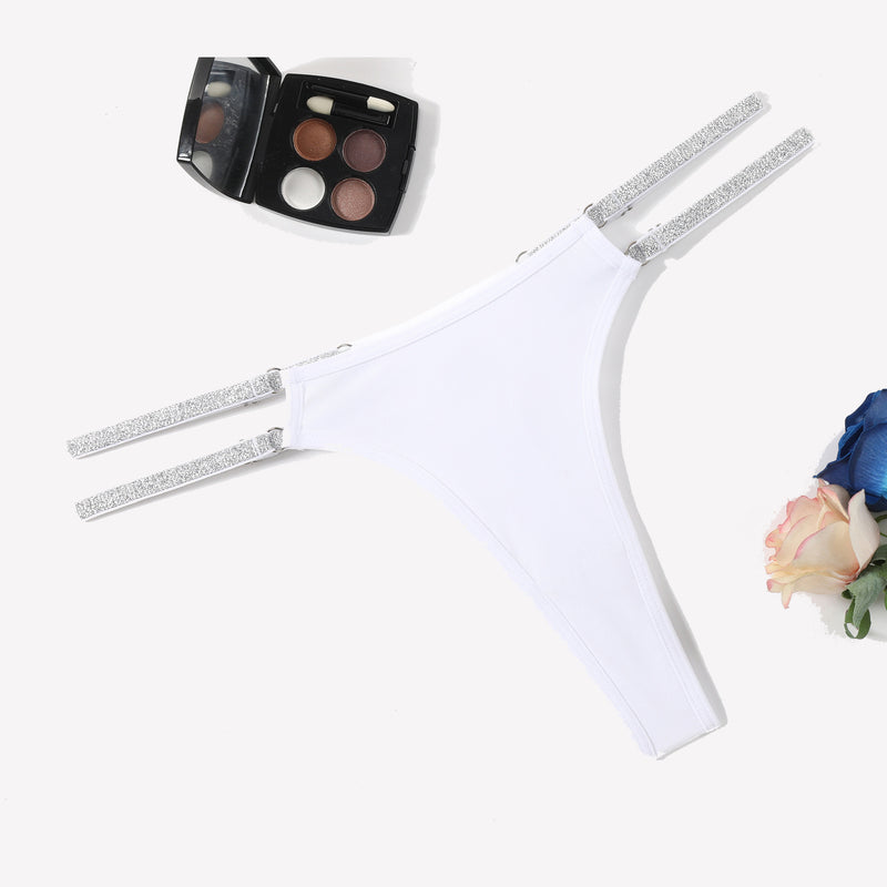 White low waist Brazilian tanga panties with flashing strap details. Sexy lingerie.