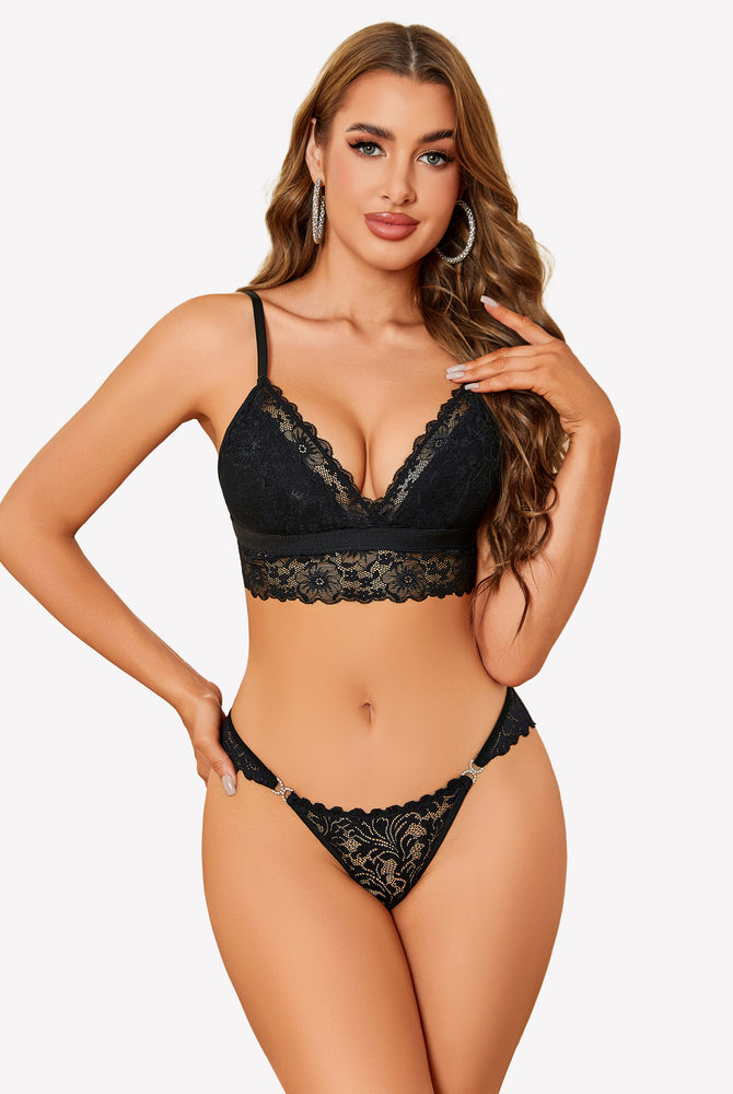 Black lace low-rise cheeky tanga underpants on model
