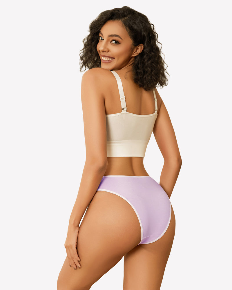 Purple cotton hipster panties with white trim, low rise, paired with white bra, smiling woman