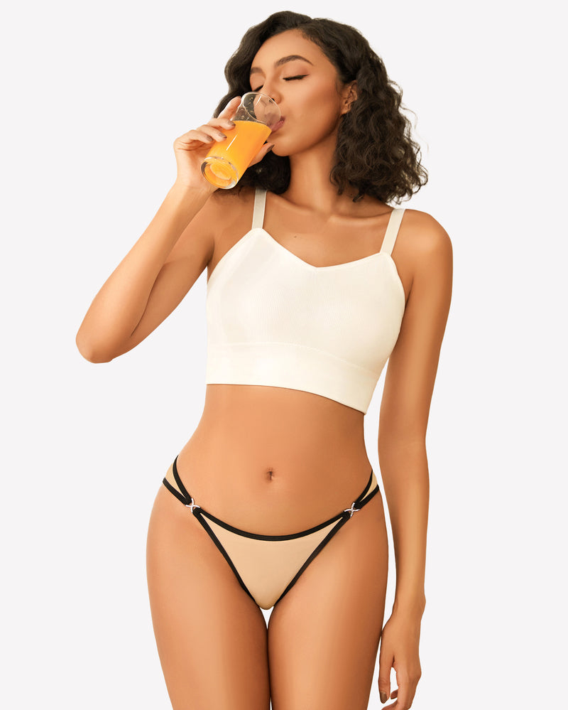Beige low rise thong panty with black trim, white crop top, sensual lingerie, rhinestone accents.