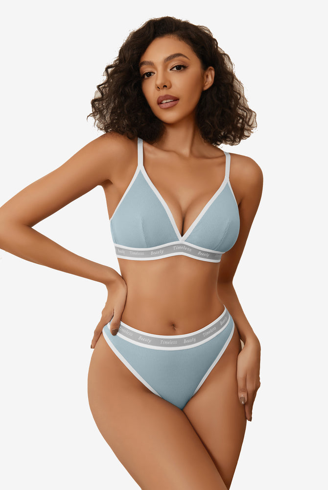 Light blue ribbed knit lingerie set with "Timeless Beauty" print and white trim.