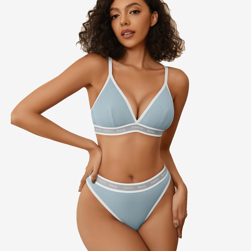 Light blue ribbed knit lingerie set with "Timeless Beauty" print and white trim.