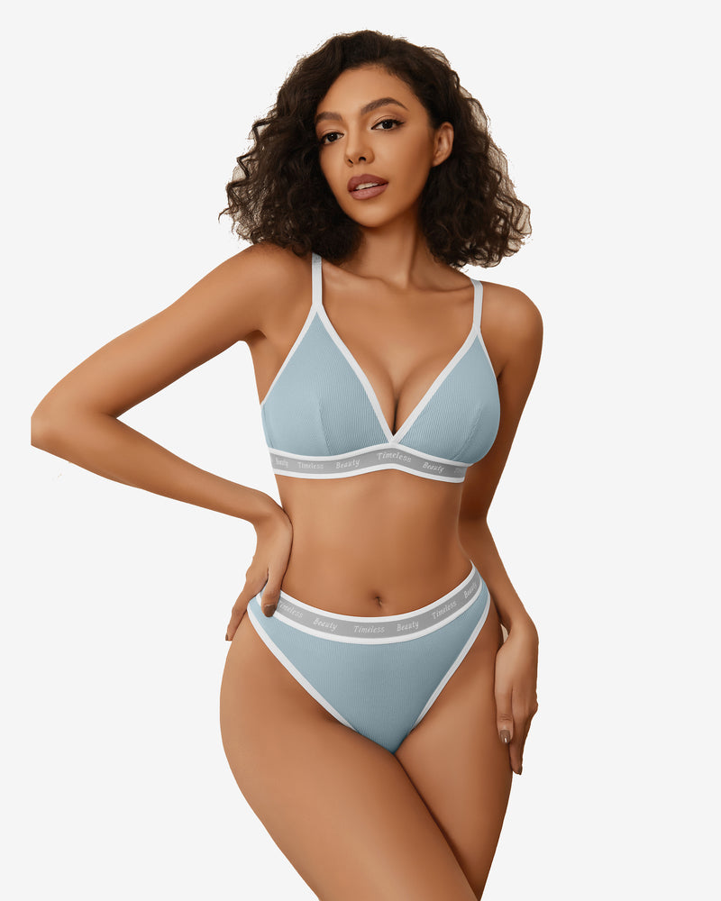 Light blue ribbed knit lingerie set with "Timeless Beauty" print and white trim.