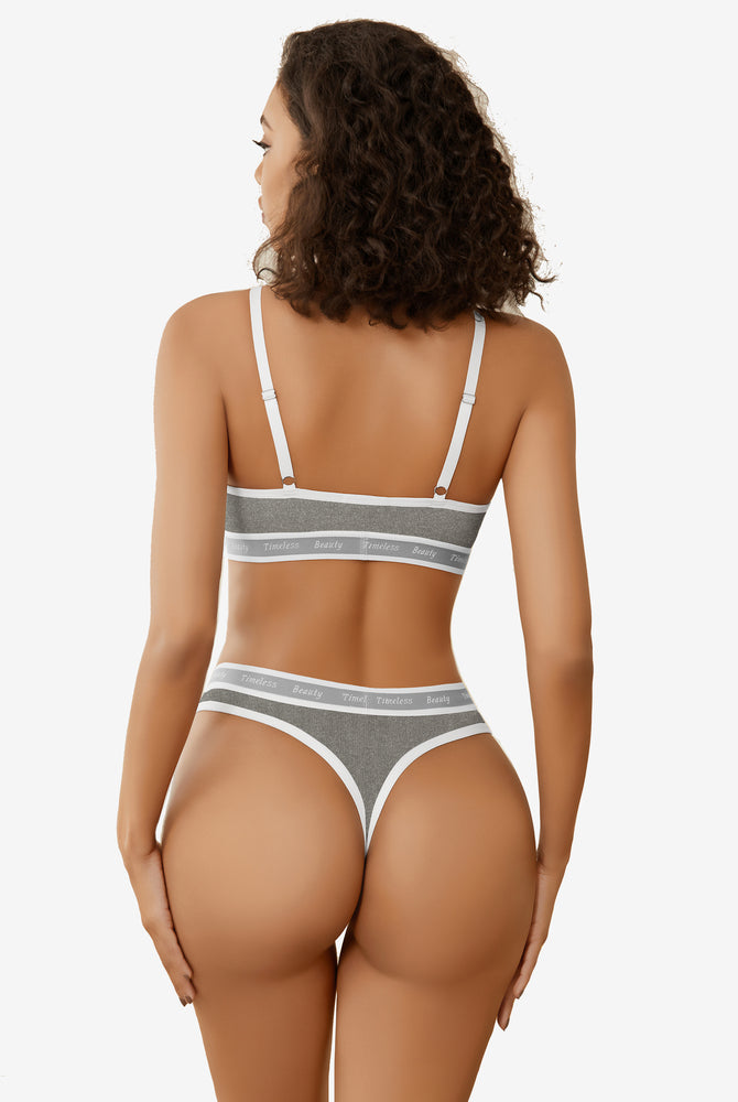 Gray ribbed knit contrast bra and panty set with white trim and "Timeless Beauty" print