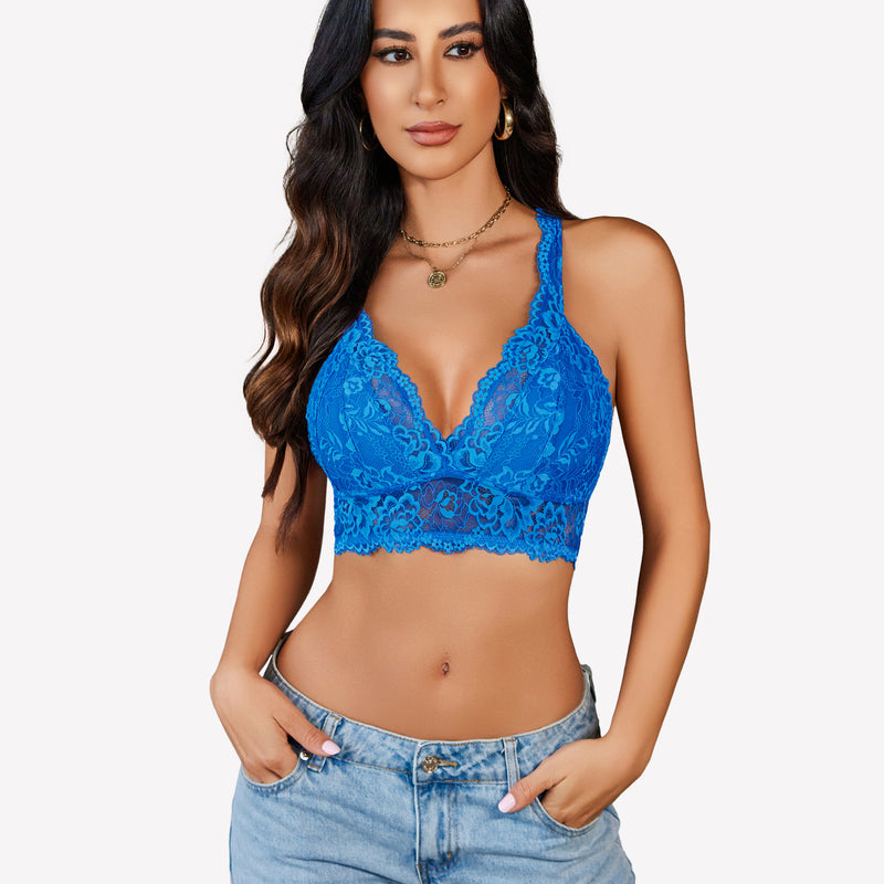 Blue lace bralette with plunging neckline and racerback, paired with jeans.