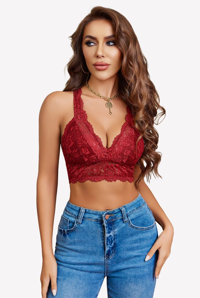 Burgundy lace bralette with plunging neckline, racerback, and jeans. Stylish wireless bra.