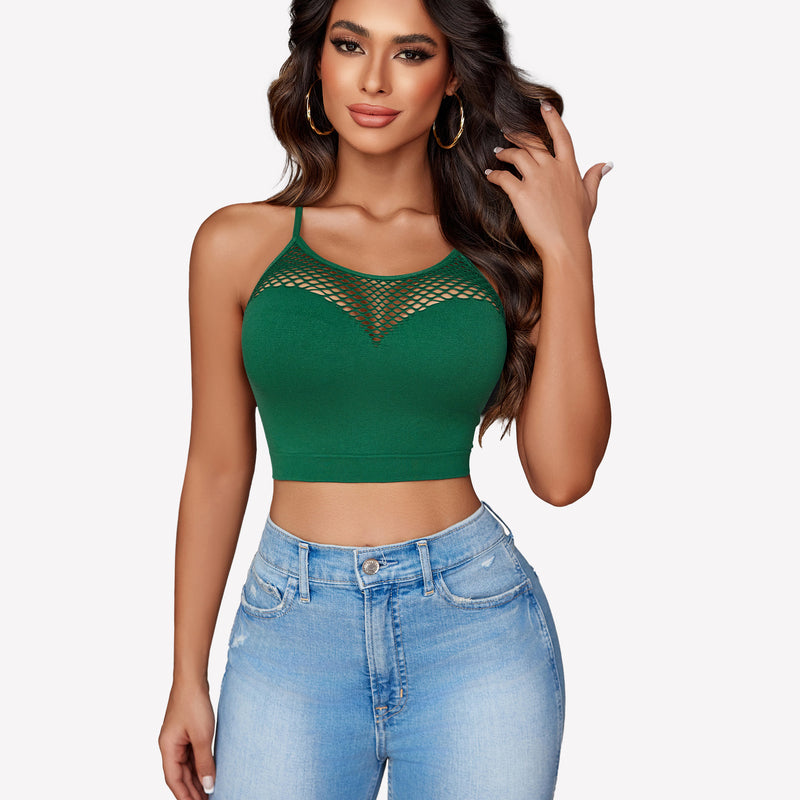 Green fishnet crop top Y2k bralette with mesh detail, showing attractive curves, paired with jeans