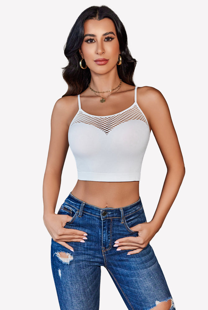 White fishnet crop top bralette with mesh detail, paired with blue jeans, showing attractive curves.