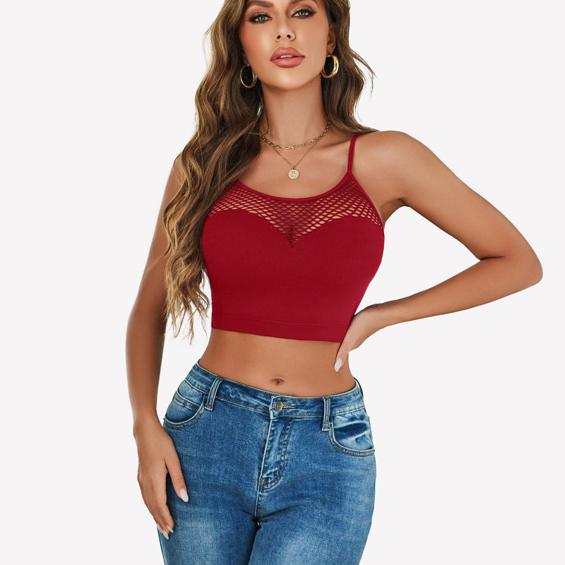Burgundy fishnet crop top Y2k bralette with mesh detail, paired with blue jeans, showing curves.